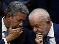 Brazil's new President Luiz Inacio Lula da Silva (R) talks with the President of the Chamber of Deputies Arthur Lira (L)